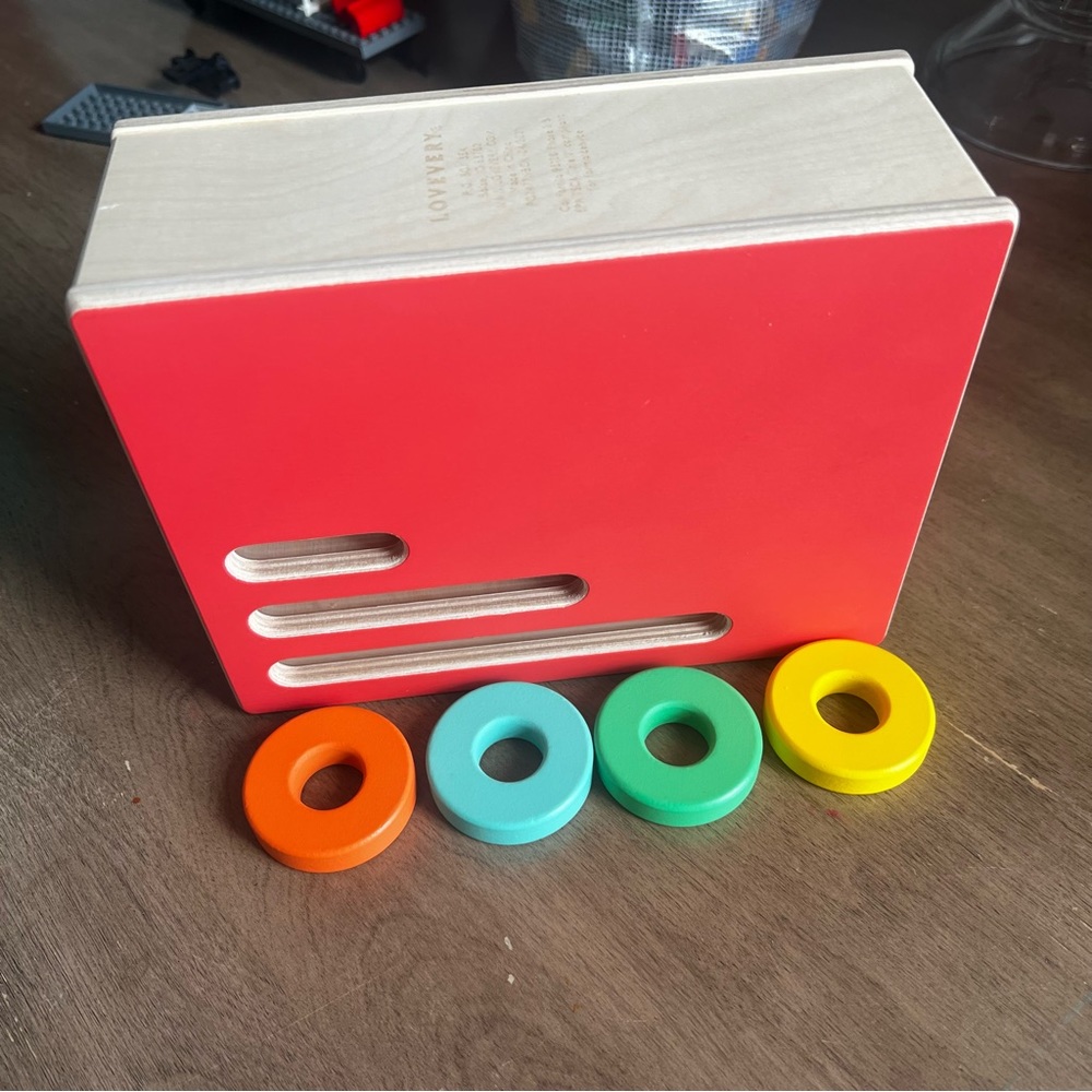 Lovevery Disk Slide Montessori Toy - like new.